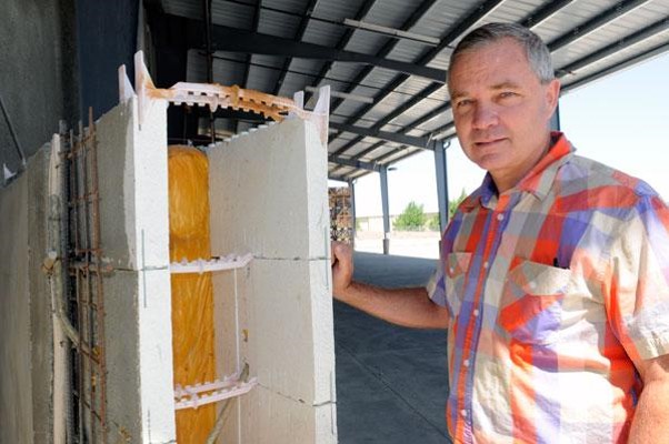 Richard Collins, CEO 
California Vegetable Specialties with the Energy Mass wall mock up.  
In front of the most energy efficient cold storage building in America